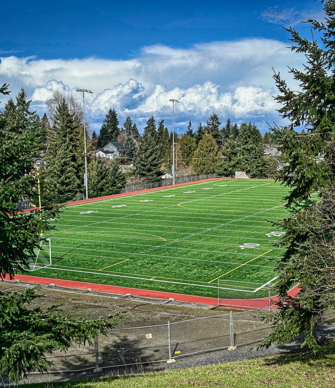 Madison middle school dedicates new athletic field track and lighting